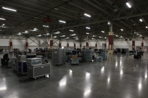Cases of equipment fill the Wisconsin Expo Center before a large event for our client. 